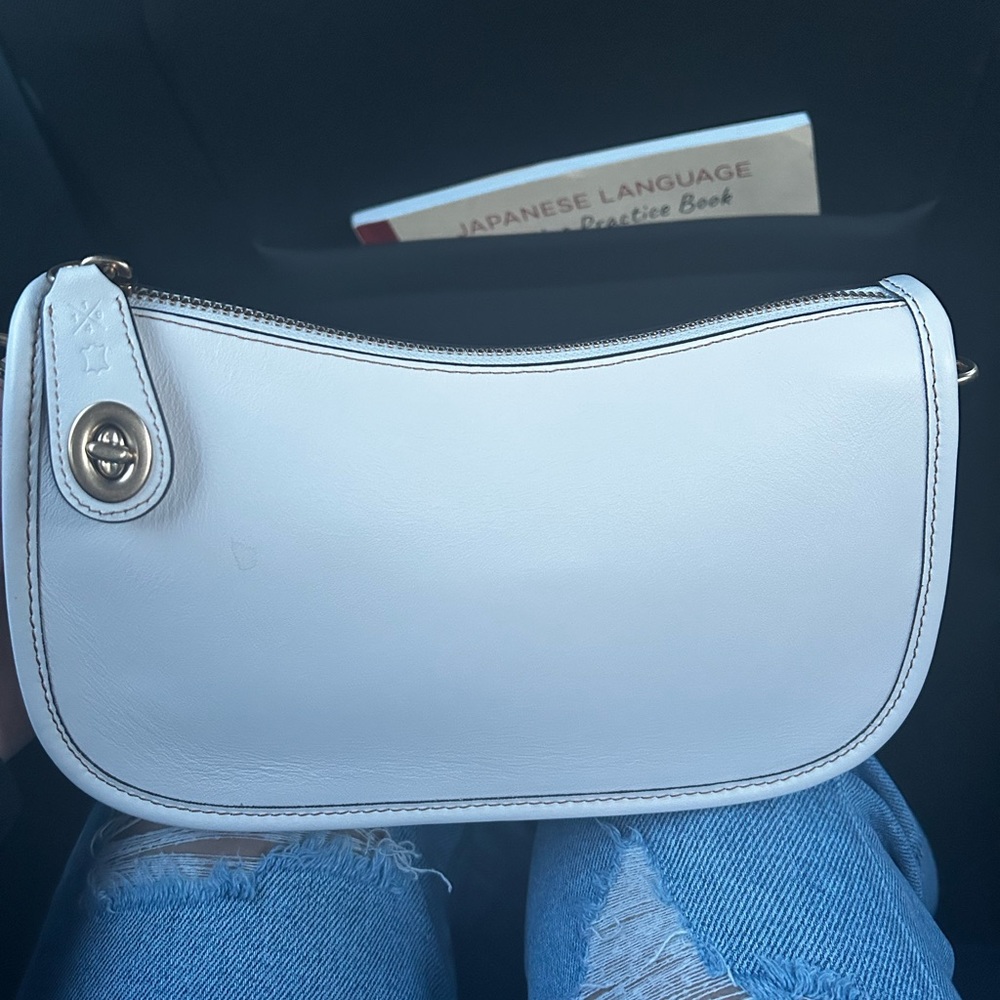 Ivory coach swinger bag